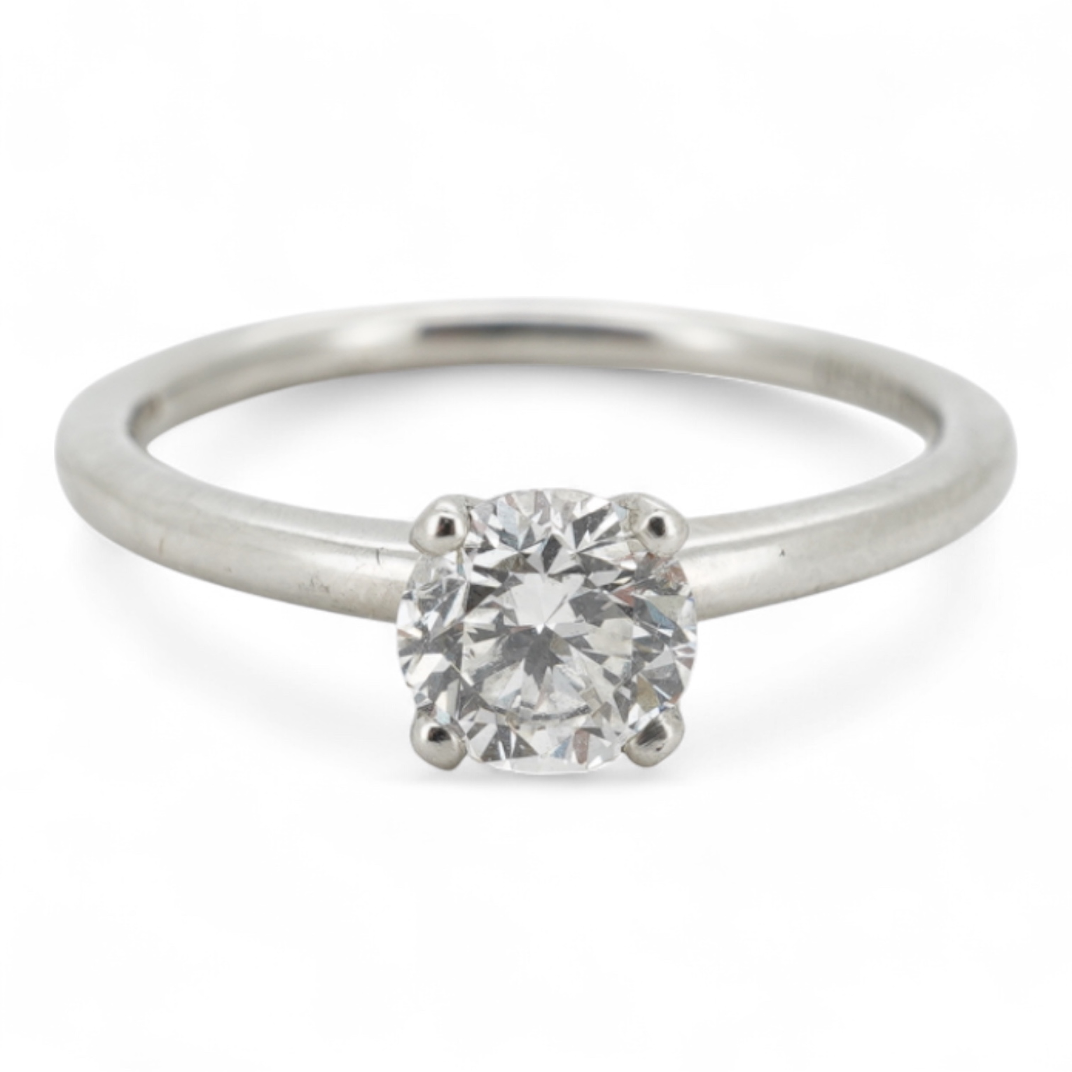 A diamond ring, claw-set with a brilliant-cut diamond weighing approximately 0.52 carats, mounted in platinum, size L1/2, British hallmarks, gross weight approximately 3 grams